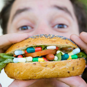 eating bun with pills